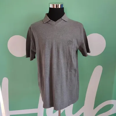 Polo grigio scura, marca Gianfranco Ferrè, taglia assente, ma a vista sembra essere una XL