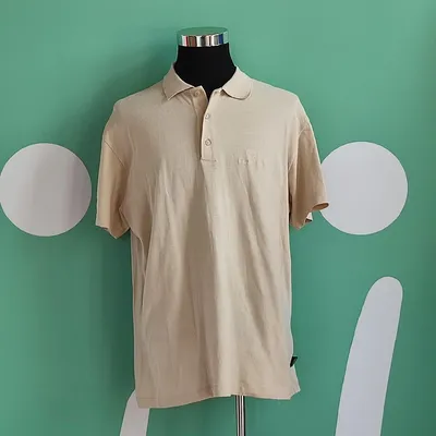 Polo semplice estiva a tinta unita di colore beige, in 100% cotone