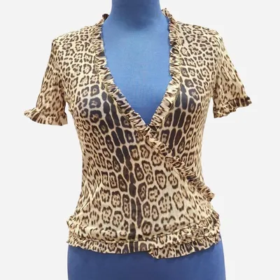Blusa a mezza manica con chiusura ad incrocio. Marca Roberto Cavalli